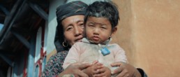 Film still - Nepali woman and child